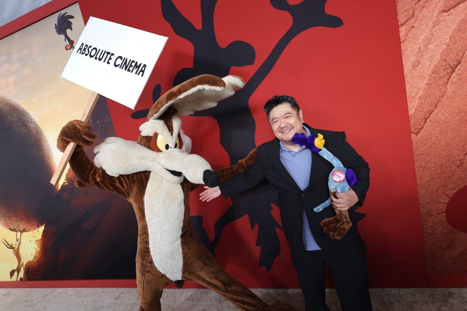 LOS ANGELES, CALIFORNIA - AUGUST 26: Wile E. Coyote (L) and Eric Bauza are seen at the Los Angeles Premiere of Ketchup Entertainment's "Coyote Vs Acme" at Westwood Village Theater on August 26, 2026 in Los Angeles, California. (Photo by Eric Charbonneau/Ketchup Entertainment via Getty Images)